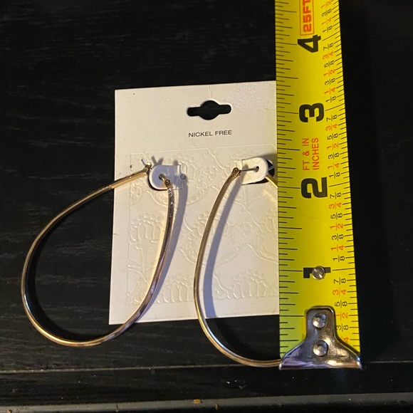 NWT Gold oval hoop earrings. 2 1/4 inches long. Nickel Free. - Picture 3 of 3